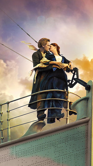 Titanic Jack and Rose Embracing on the Ship's Bow Against a Dramatic Sky HD phone wallpaper