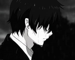 Melancholic Anime Boy in Rain with Dark Hair and Shadowed Expression HD wallpaper