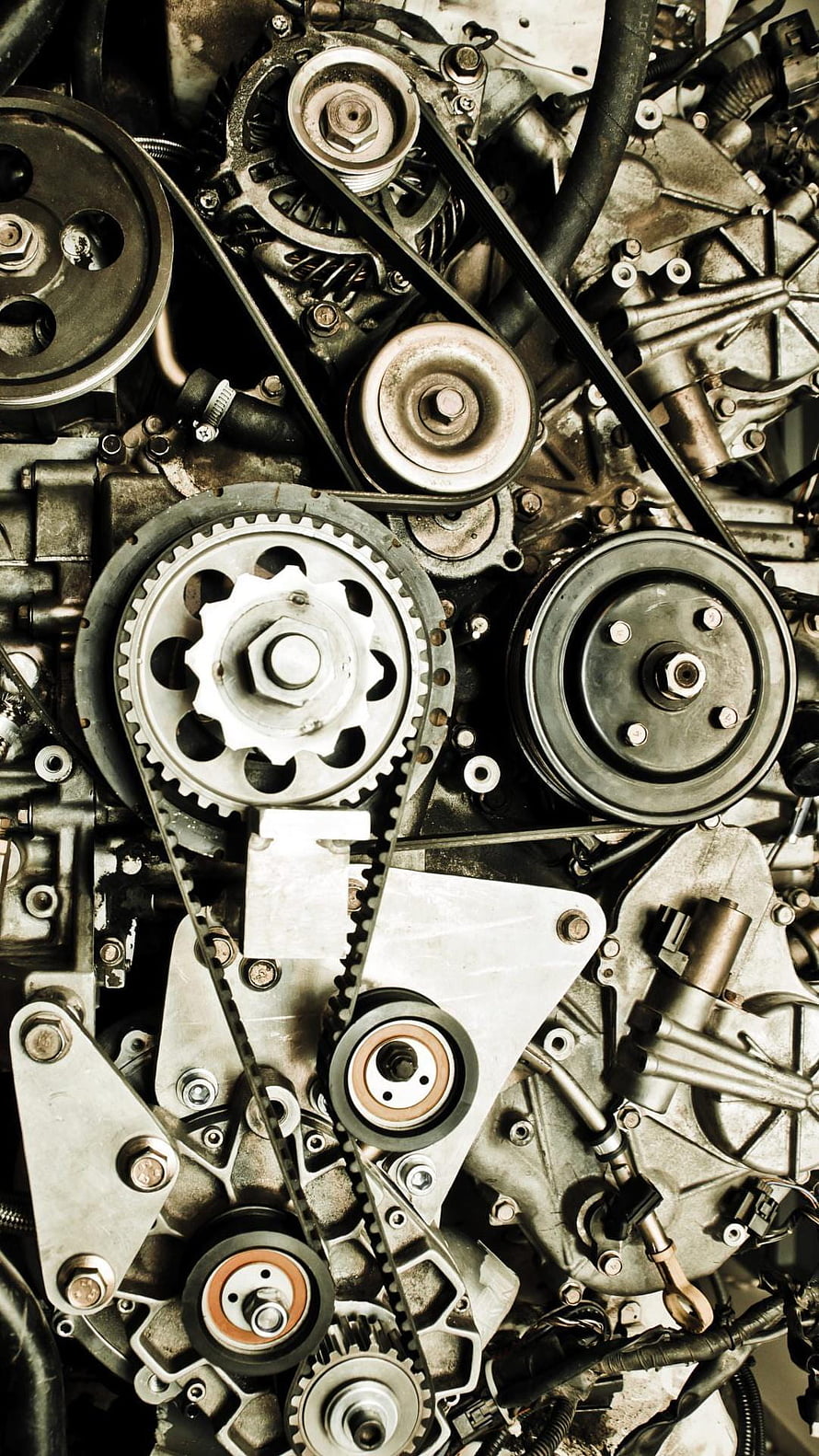 Close-Up of Car Engine Timing Belt, Pulleys, and Mechanical Gears HD phone wallpaper