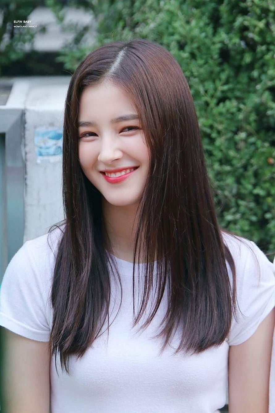 Nancy from Momoland smiling in a white t-shirt with long dark hair HD phone wallpaper