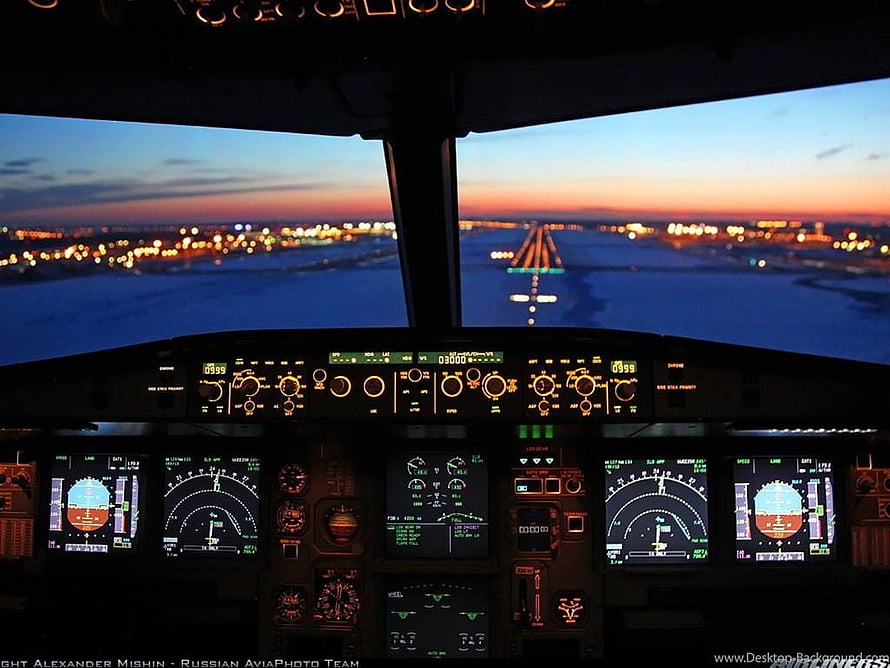 Airbus A320 Cockpit View During Sunset Approach Over Illuminated City HD wallpaper