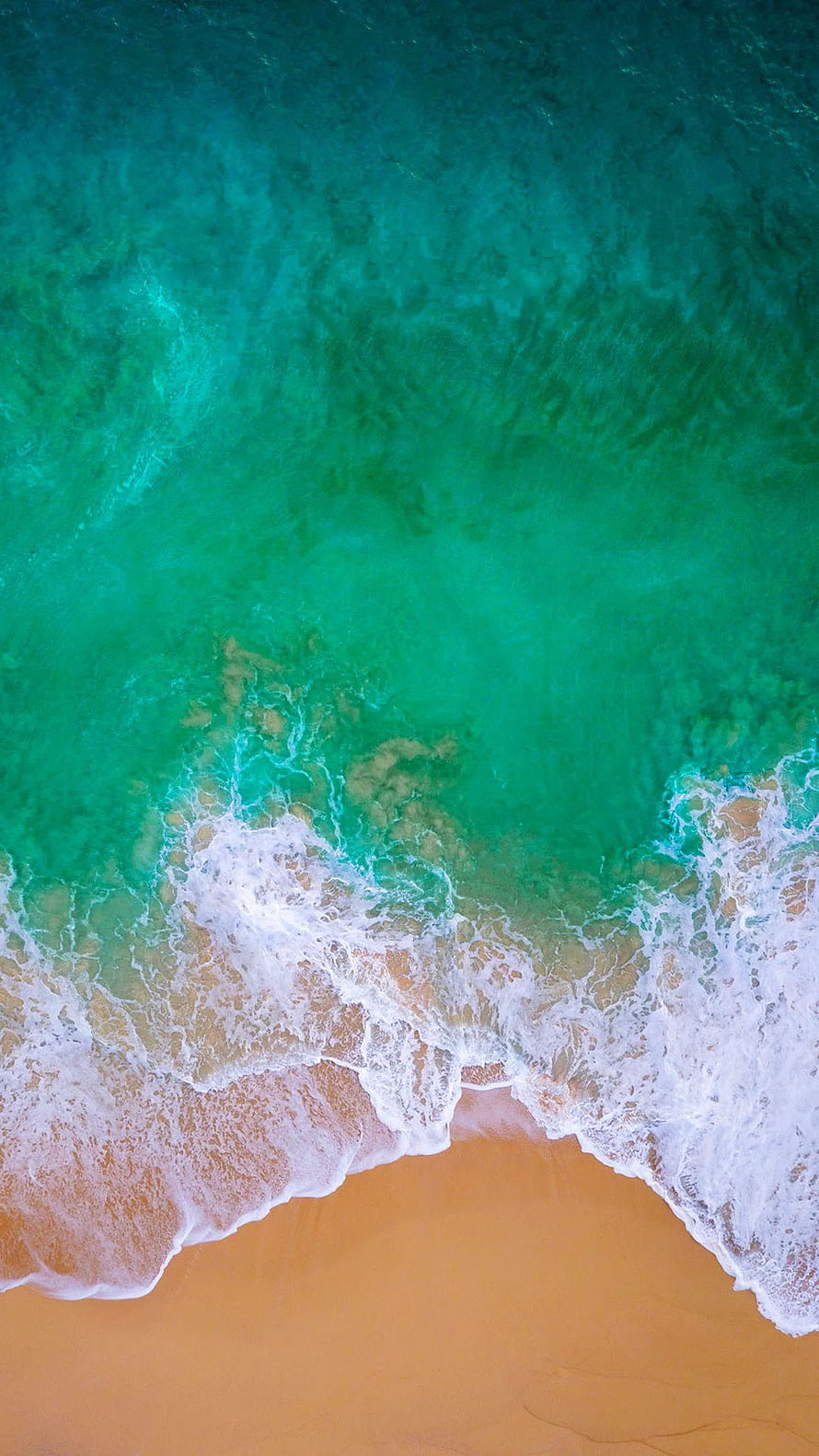 Aerial View of Turquoise Ocean Waves Crashing on Golden Sandy Beach HD phone wallpaper