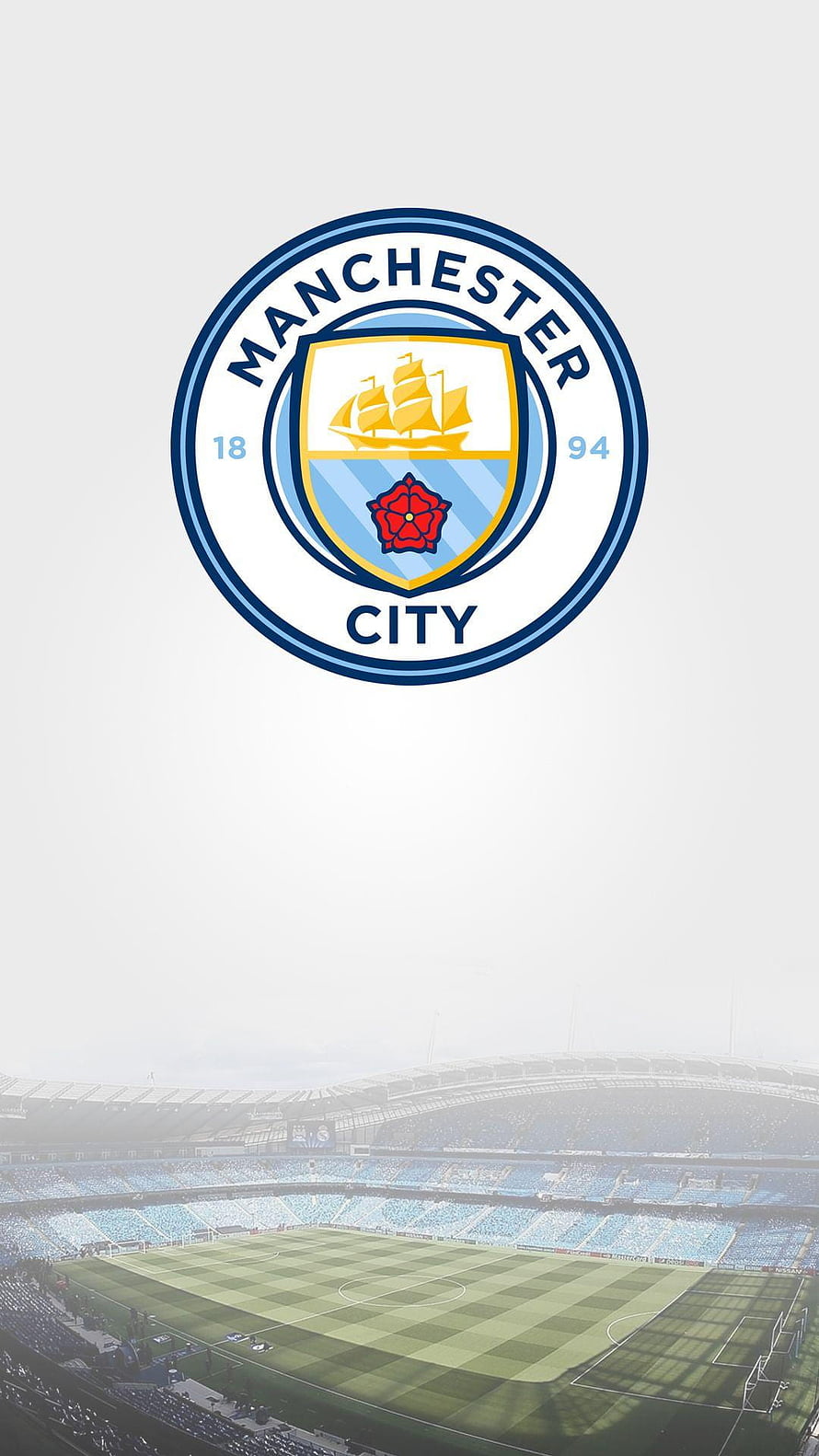 Manchester City FC Crest Above Etihad Stadium Pitch in Misty Atmosphere HD phone wallpaper