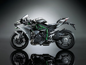 Kawasaki Ninja H2 Superbike in Silver and Green on Studio Background HD wallpaper