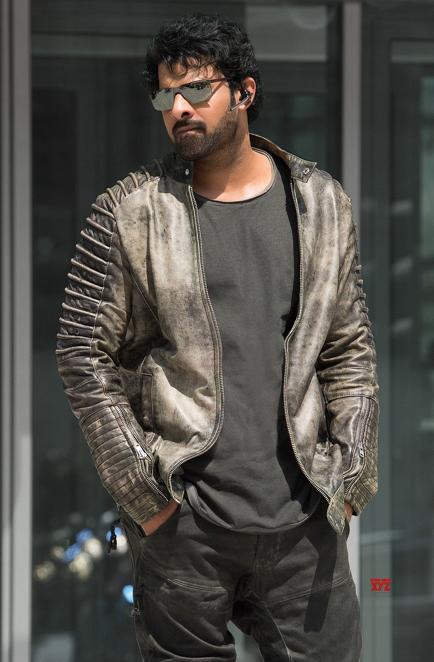 Pawan Kalyan in a distressed leather jacket and sunglasses HD phone wallpaper