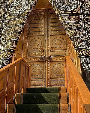 Ornate Golden Mosque Door With Arabic Calligraphy And Wooden Staircase HD phone wallpaper