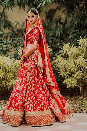Sabyasachi Red Bridal Lehenga With Gold Zari Embroidery And Traditional Jewelry HD phone wallpaper