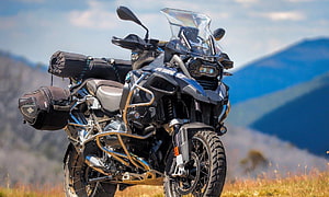 BMW R 1200GS Adventure Motorcycle Loaded with Luggage on a Mountain Trail HD wallpaper