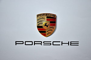 Porsche Stuttgart Crest Emblem on Clean White Background HD wallpaper