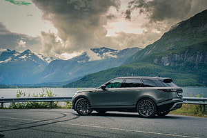 Land Rover Range Rover Velar SUV Parked on Scenic Mountain Road HD wallpaper
