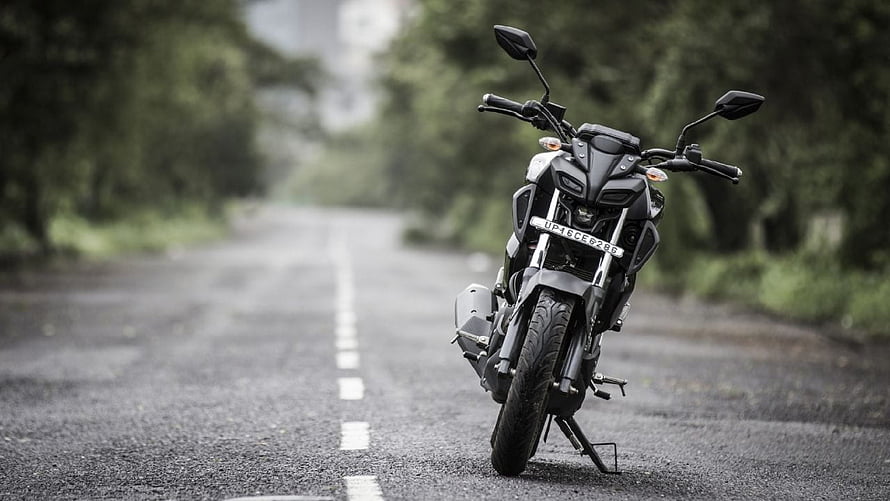 Yamaha MT-15 Motorcycle Parked on a Quiet Forest Road HD wallpaper