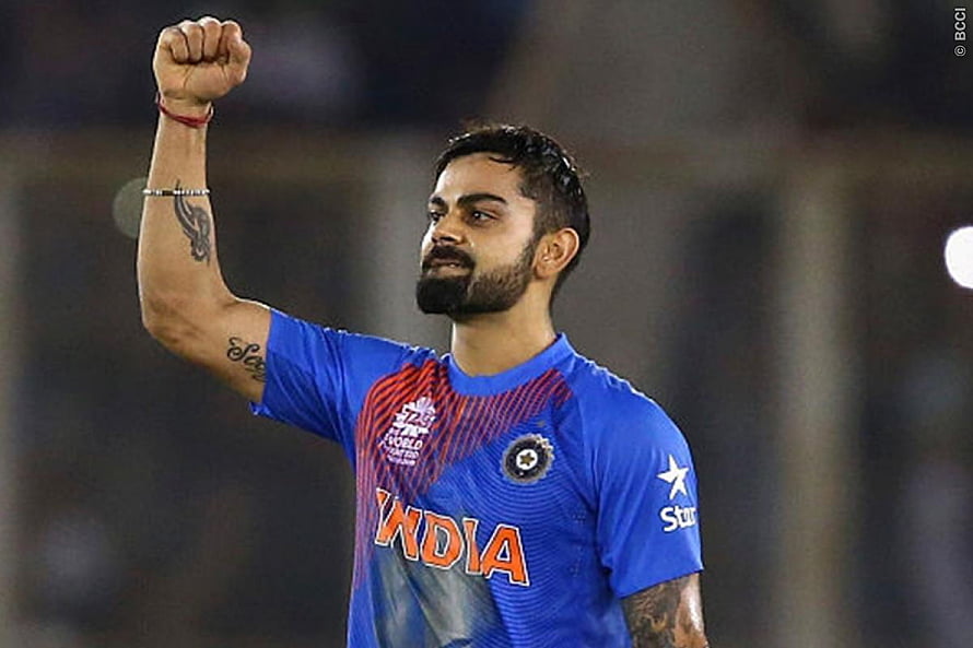 Virat Kohli Raising Fist in India Cricket Jersey at T20 World Cup HD wallpaper
