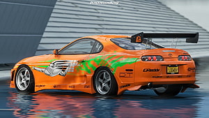 Orange Toyota Supra JDM Drift Car with Green Graphics and Large Rear Wing HD wallpaper