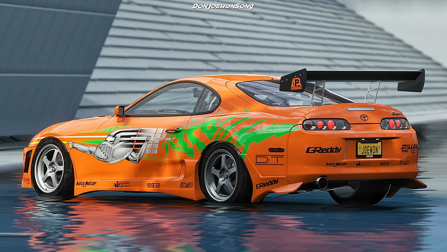 Orange Toyota Supra JDM Drift Car with Green Graphics and Large Rear Wing HD wallpaper
