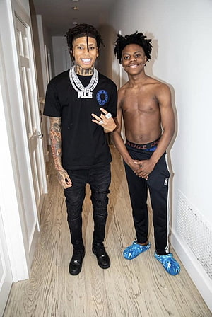Speed and Ishowspeed Posing Together in a Bright Indoor Hallway HD phone wallpaper