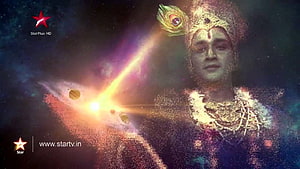 Lord Krishna Vishwaroop from Mahabharat with Cosmic Energy and Peacock Crown HD wallpaper