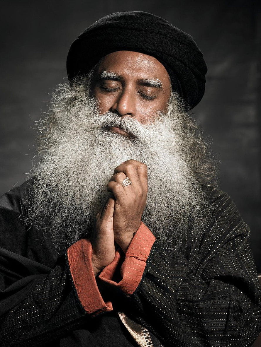 Portrait of Sadhguru with eyes closed in meditation and hands in prayer position HD phone wallpaper