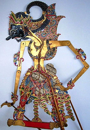 Gatotkaca Wayang Kulit Shadow Puppet with Intricate Batik Patterns and Gold Accents HD phone wallpaper