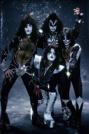 Kiss Band Members in Iconic Face Paint and Sparkling Stage Costumes HD phone wallpaper
