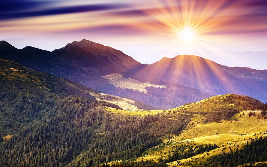 Golden Sunburst Over Forested Mountain Ridges at Dawn HD wallpaper