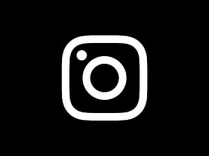 Minimalist White Instagram Logo Icon on Black Background HD wallpaper