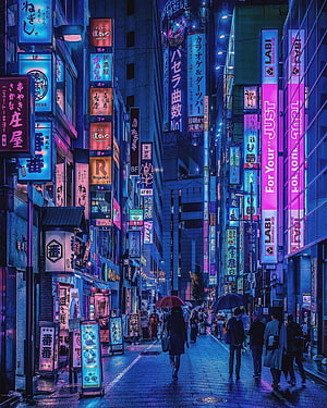 Vibrant Neon Lights of Shinjuku Street at Night with Pedestrians HD phone wallpaper