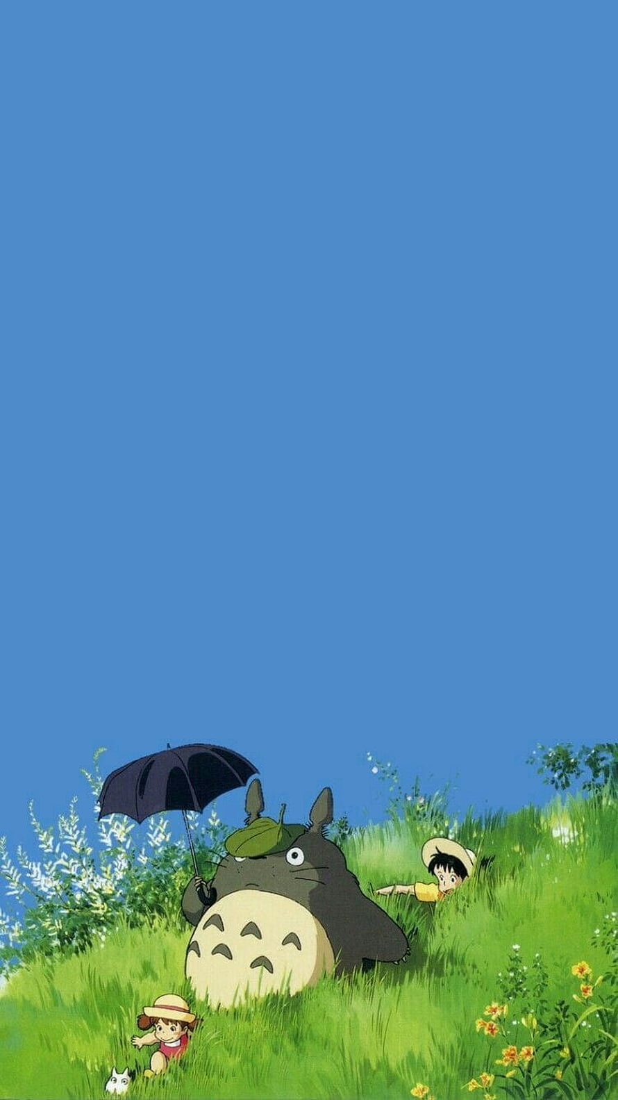 Totoro and Children in a Lush Green Field Under a Blue Sky HD phone wallpaper