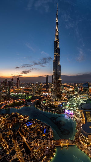 Aerial View of Burj Khalifa and Dubai Fountain at Sunset HD phone wallpaper