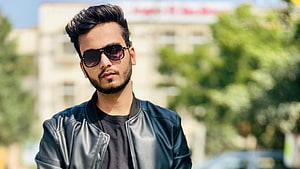 Elvish Yadav in Black Leather Jacket and Sunglasses Outdoors HD wallpaper