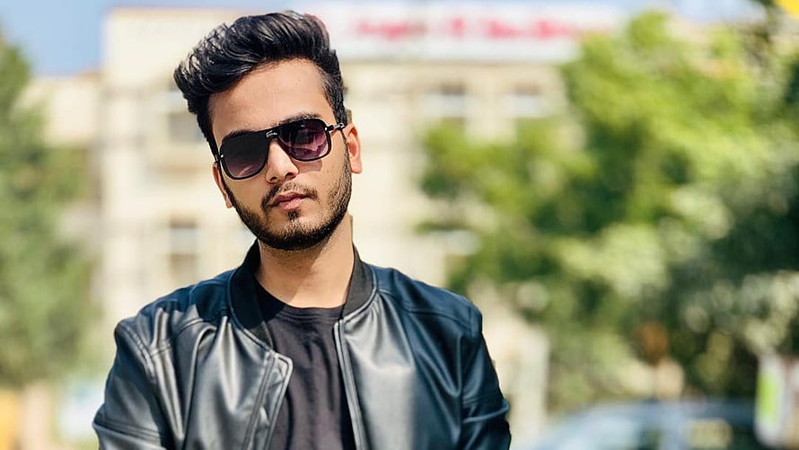 Elvish Yadav in Black Leather Jacket and Sunglasses Outdoors HD wallpaper