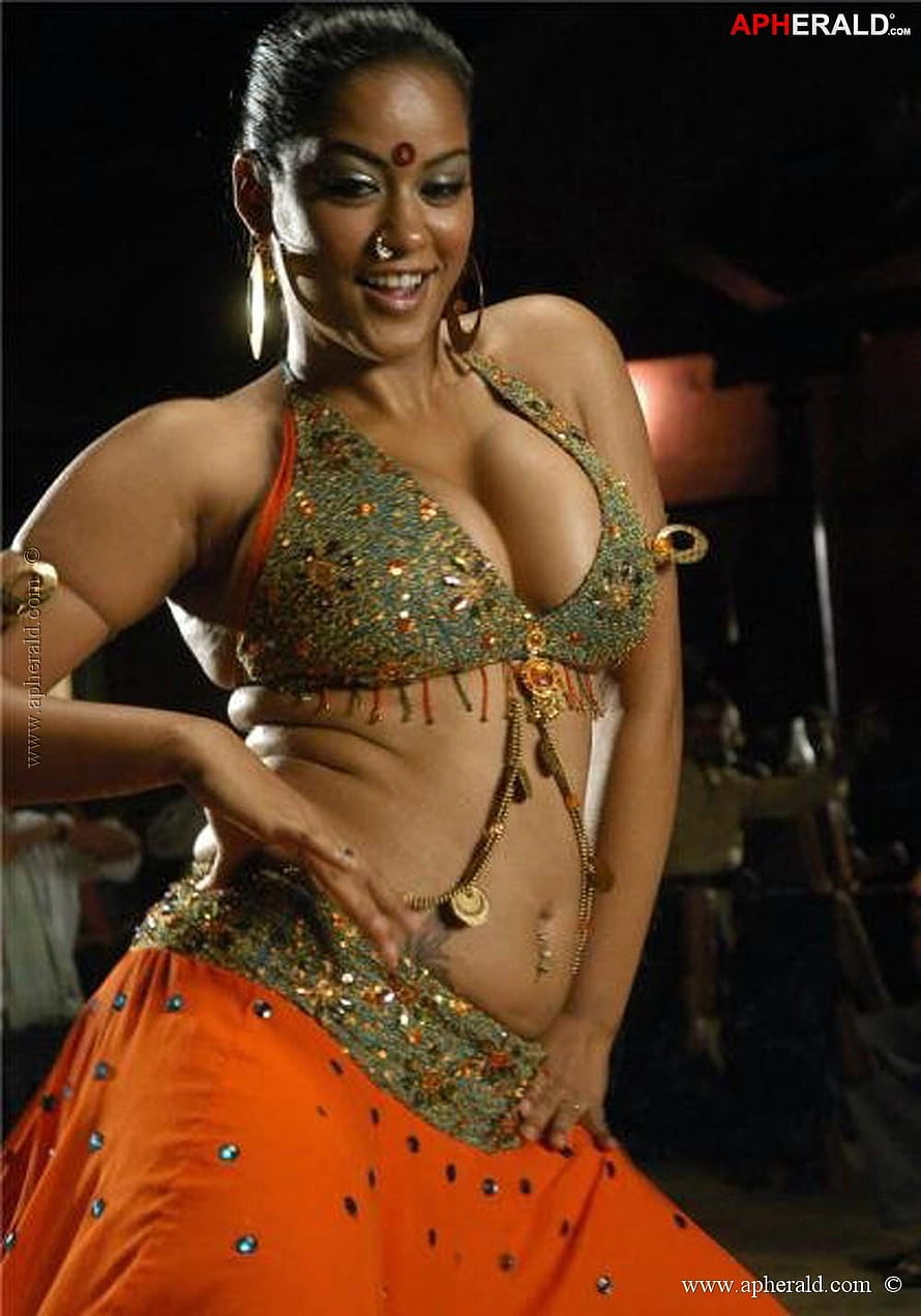 Mumaith Khan in Traditional Indian Dance Costume with Gold Jewelry and Orange Skirt HD phone wallpaper