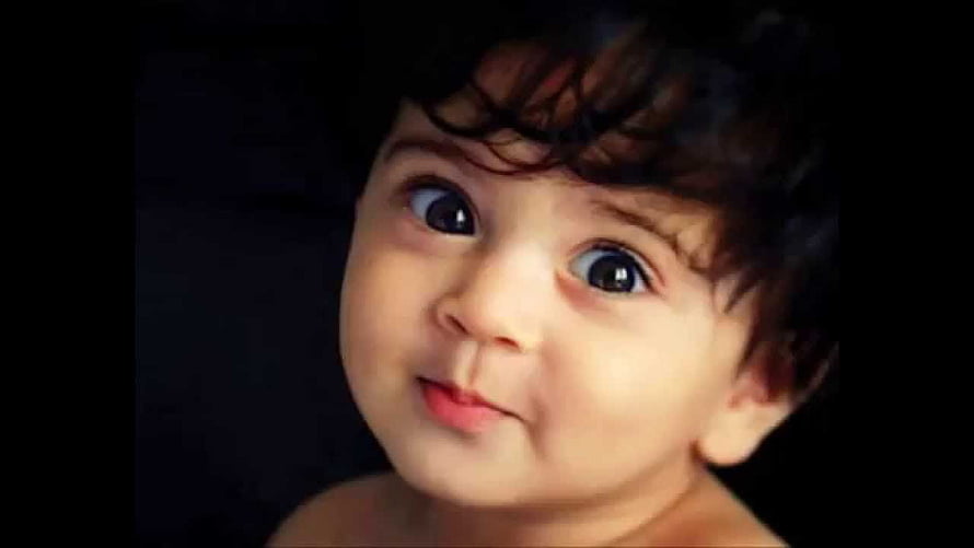 Adorable Indian Baby Portrait With Curly Hair And Bright Eyes HD wallpaper