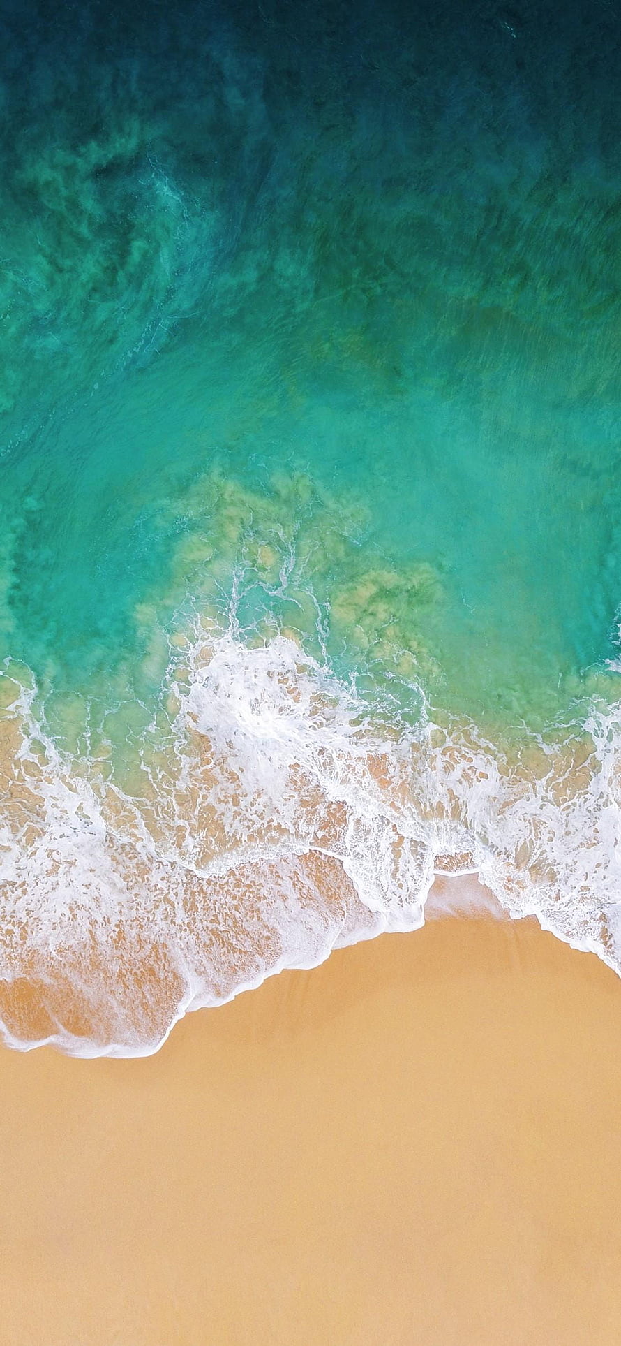 Aerial View of Turquoise Ocean Waves Crashing on Golden Sandy Beach HD phone wallpaper