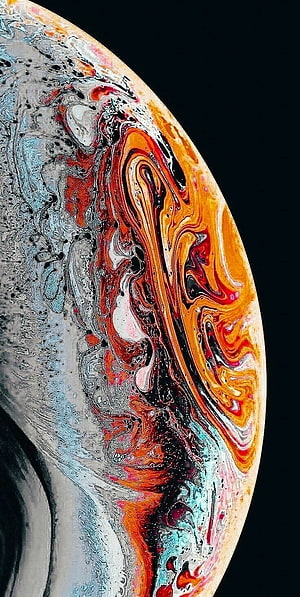 Vibrant Fluid Art Sphere with Swirling Orange and Blue Paint on Black Background HD phone wallpaper