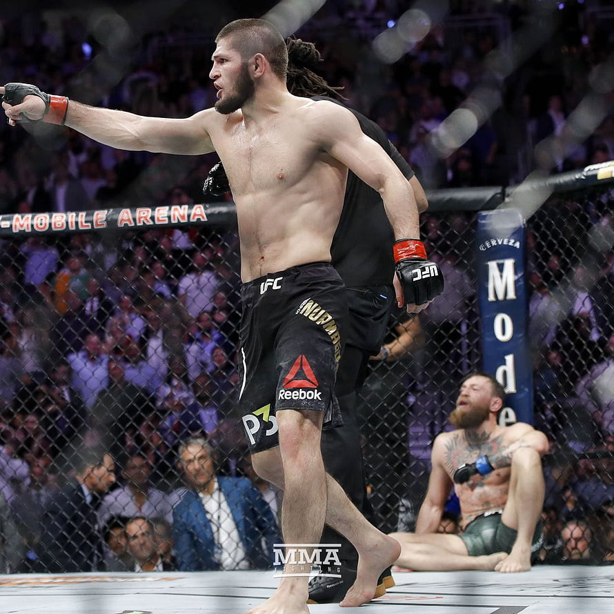 Khabib Nurmagomedov Celebrates Victory Over Conor McGregor in UFC Octagon HD phone wallpaper