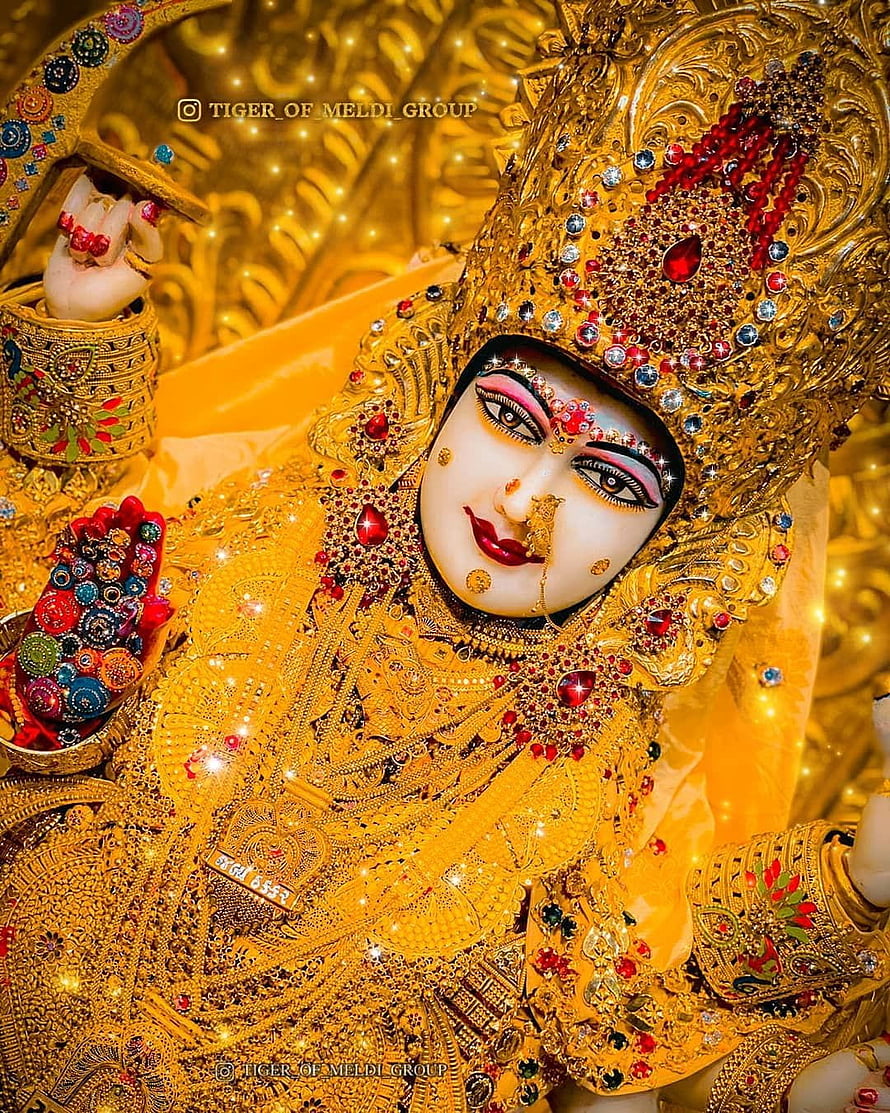 Goddess Durga adorned in golden jewelry and crown with red gemstones HD phone wallpaper