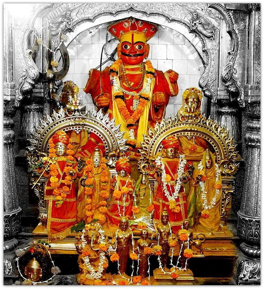 Colorful Hindu Deities in Silver Temple Shrine with Marigold Garlands HD phone wallpaper