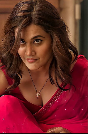 Taapsee Pannu in a vibrant red sari with a delicate gold necklace and soft wavy hair HD phone wallpaper