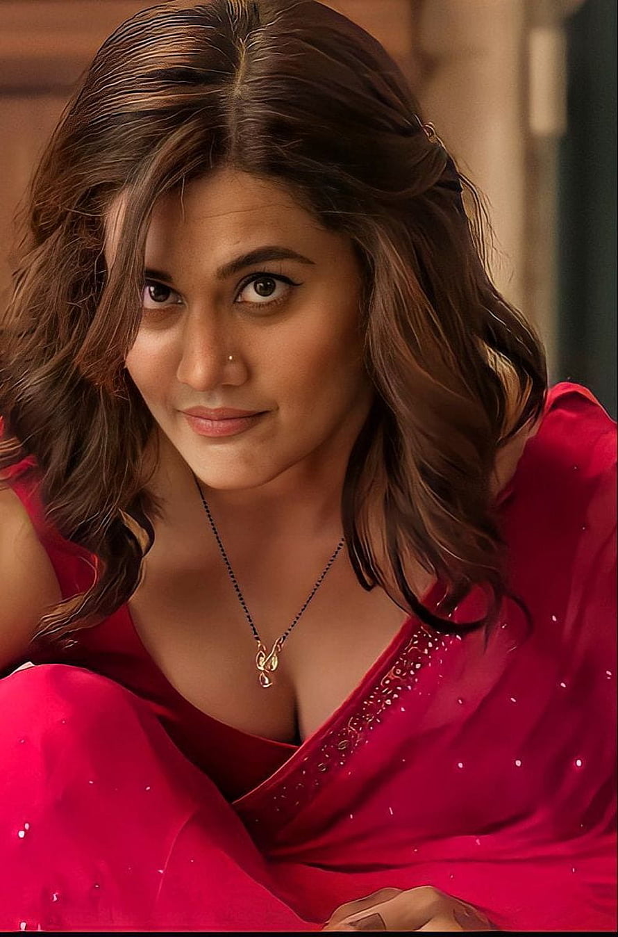 Taapsee Pannu in a vibrant red sari with a delicate gold necklace and soft wavy hair HD phone wallpaper