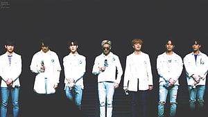 BTS Members in White Jackets and Jeans on Stage HD wallpaper