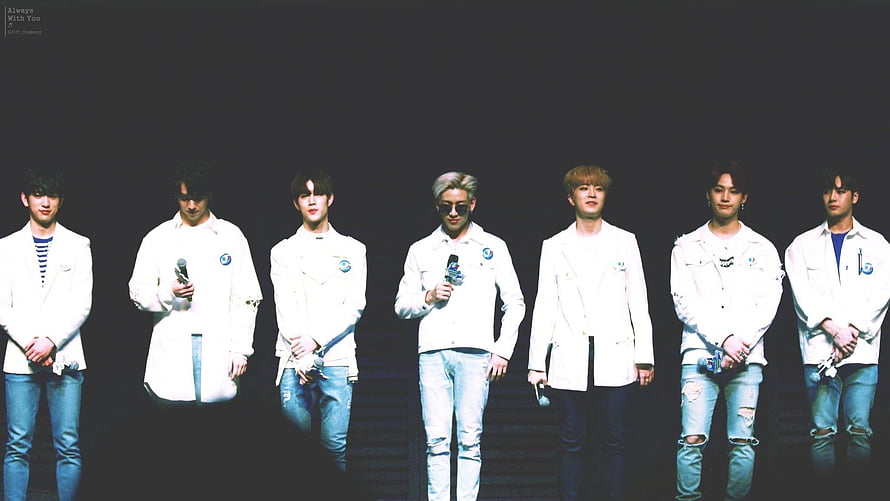 BTS Members in White Jackets and Jeans on Stage HD wallpaper