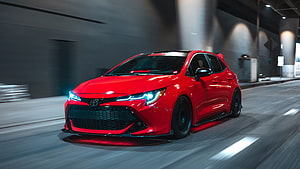 Red Toyota Corolla Hatchback with Aggressive Widebody Kit and LED Headlights HD wallpaper