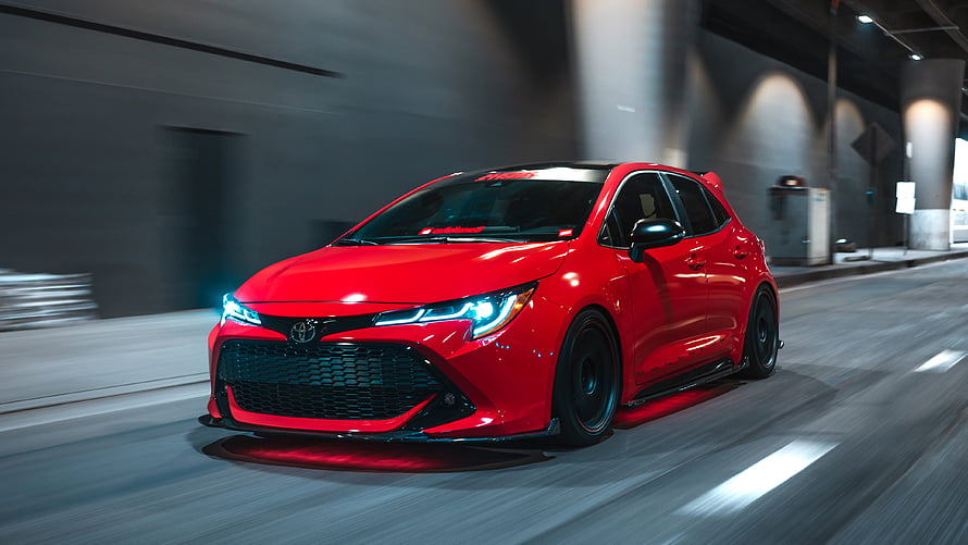 Red Toyota Corolla Hatchback with Aggressive Widebody Kit and LED Headlights HD wallpaper