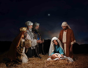The Nativity Scene with the Three Wise Men Offering Gifts to Baby Jesus HD wallpaper