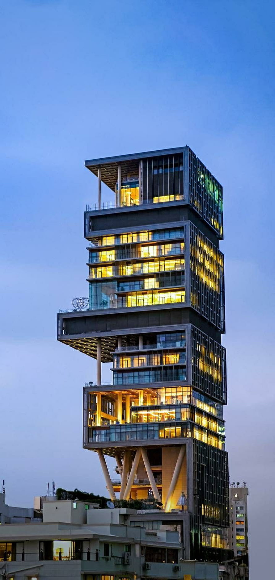 Antilia Mumbai Luxury Residence Tower at Dusk with Warm Interior Lighting HD phone wallpaper