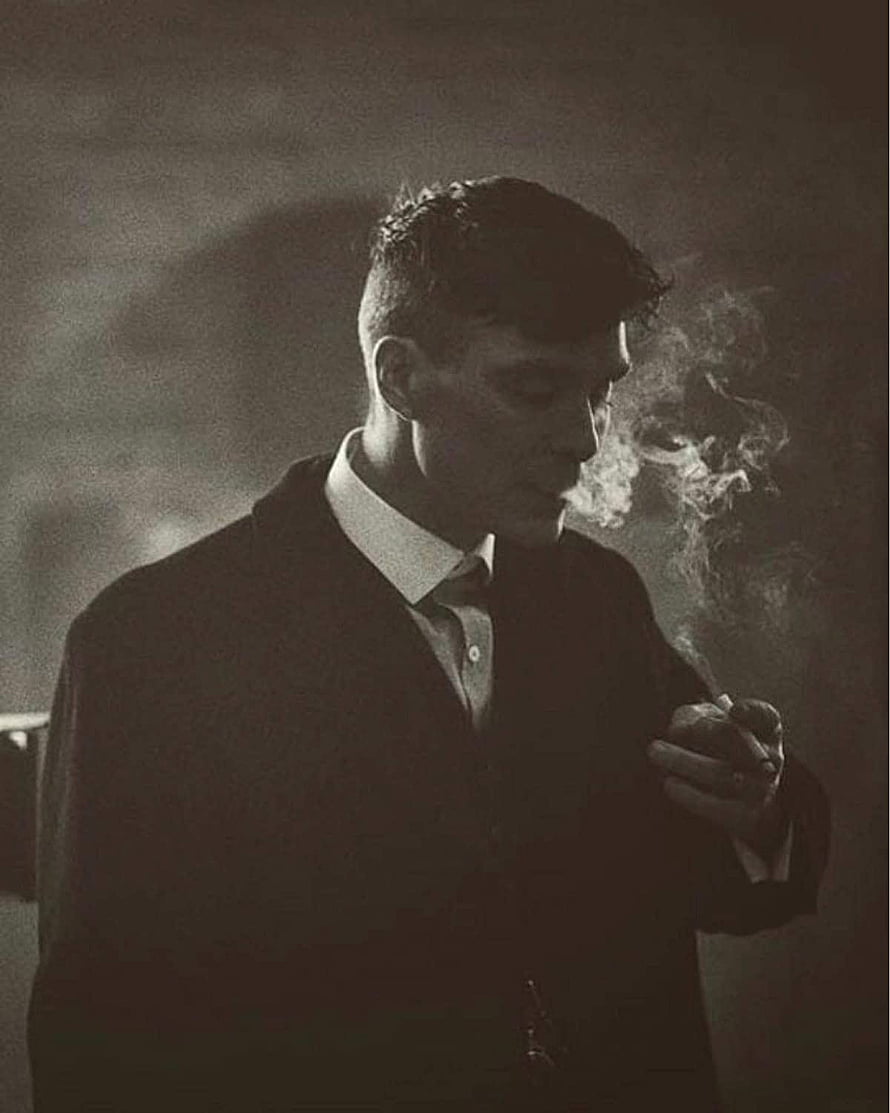 Tommy Shelby from Peaky Blinders Smoking in a Dark Moody Portrait HD phone wallpaper