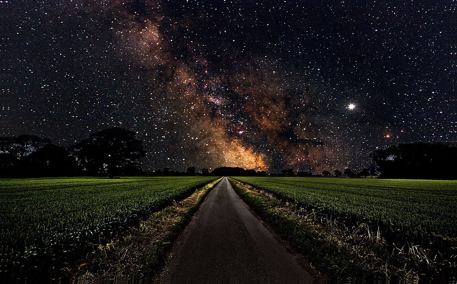 Milky Way Galaxy Rising Over a Dark Country Road at Night HD wallpaper
