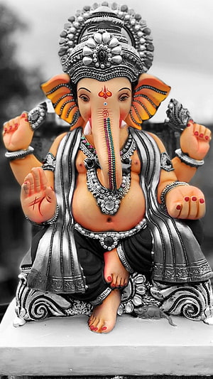 Ornate Silver Ganesha Statue with Colorful Accents and Intricate Jewelry Details HD phone wallpaper