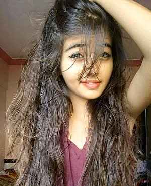 Portrait of a young woman with long wavy dark hair and a maroon top, Latest Dp For Girls Pics, cute girl dp HD phone wallpaper