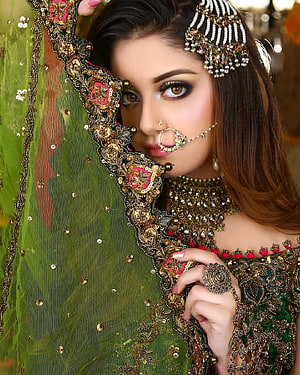 Alizeh Shah in Green Bridal Lehenga with Gold Zari Embroidery and Traditional Jewelry HD phone wallpaper